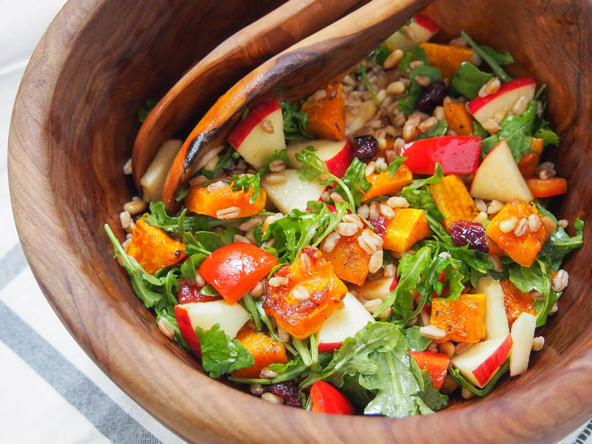 side view of bowl of butternut squash farro salad