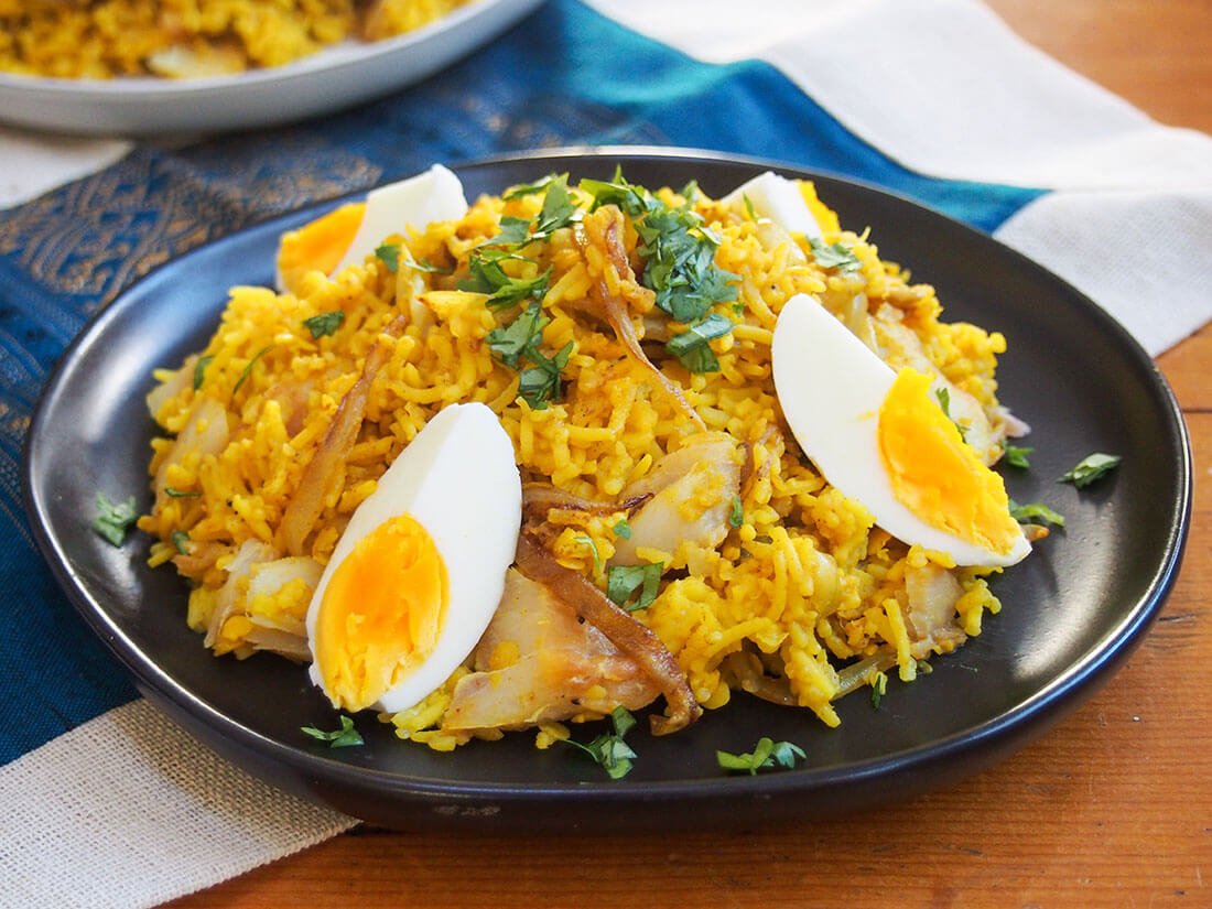 plate of kedgeree garnished with hard boiled eggs