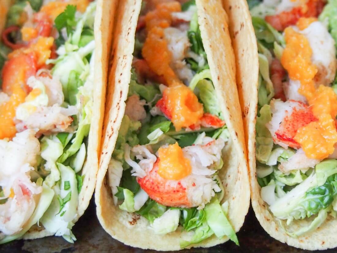 close up of lobster tacos showing fillings