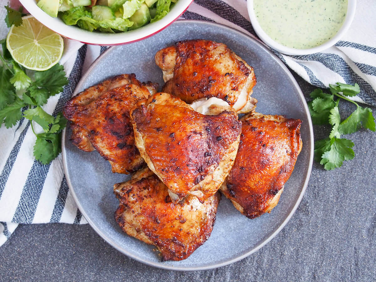 plate of Peruvian roast chicken, pollo a la brasa, from overhead